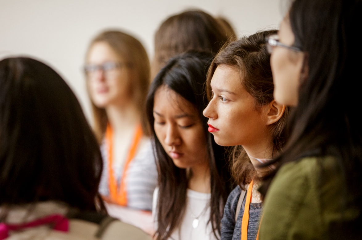 Diverse group of students listen to presentation