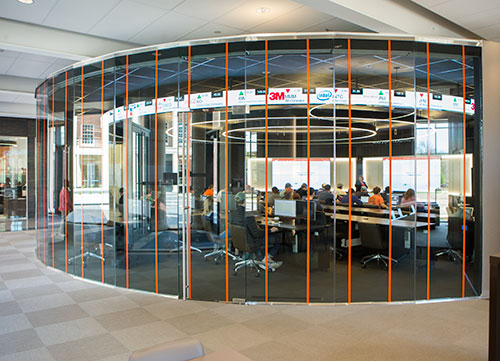 Students gather in a lab in the Spears School of Business building.