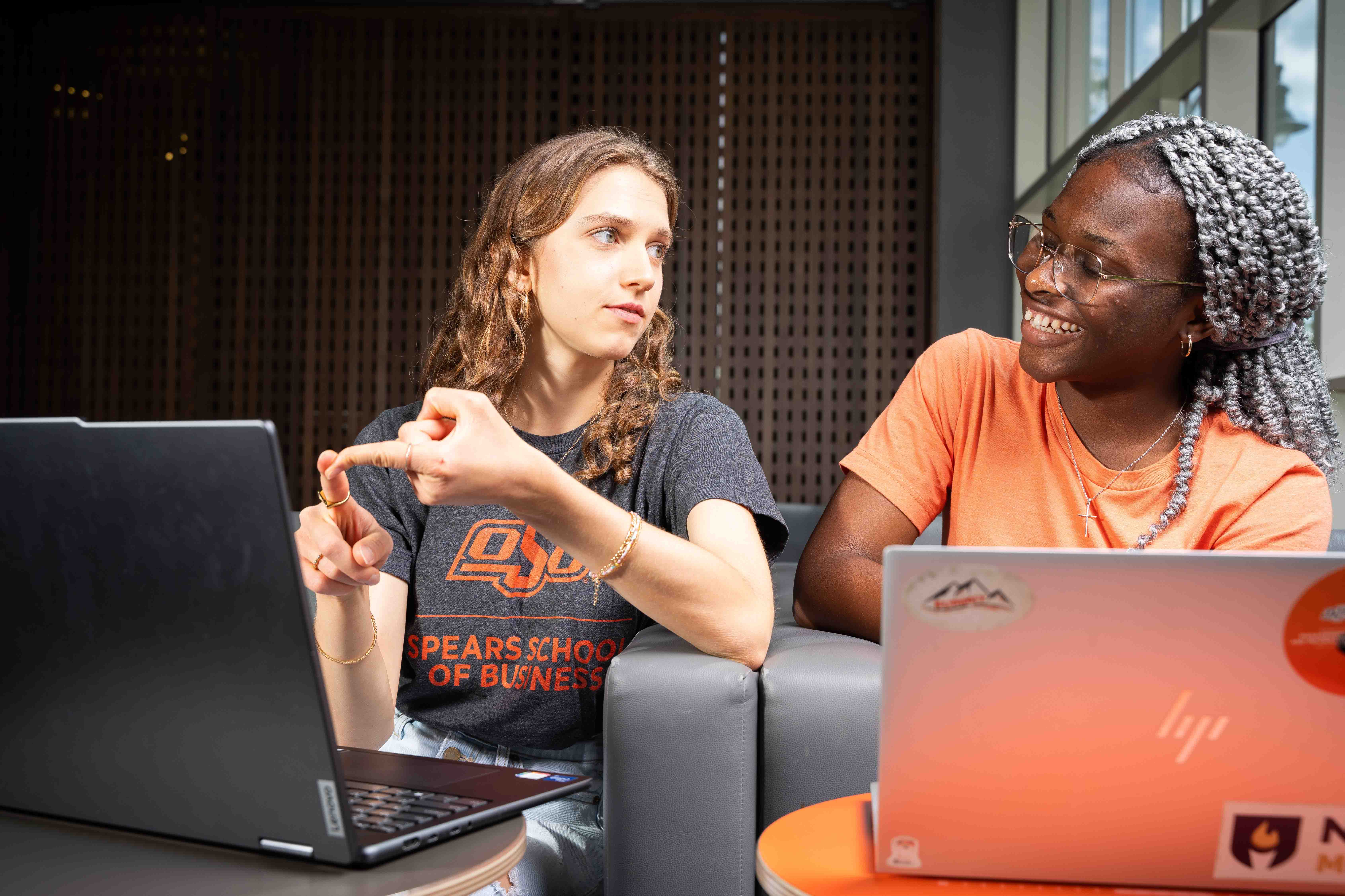 Two students studying in Spears